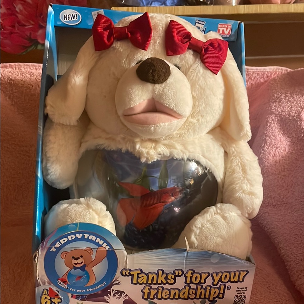 White Plush Toy with Red Bows